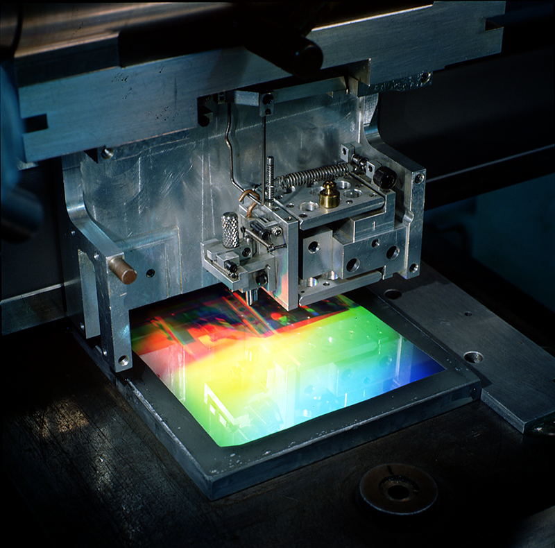 Custom ruled diffraction grating in process.