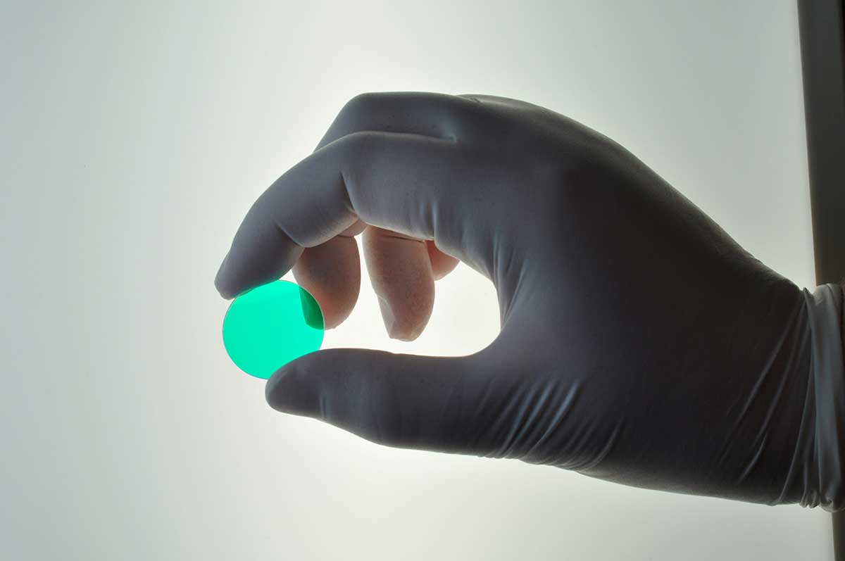 Filter being held up to light